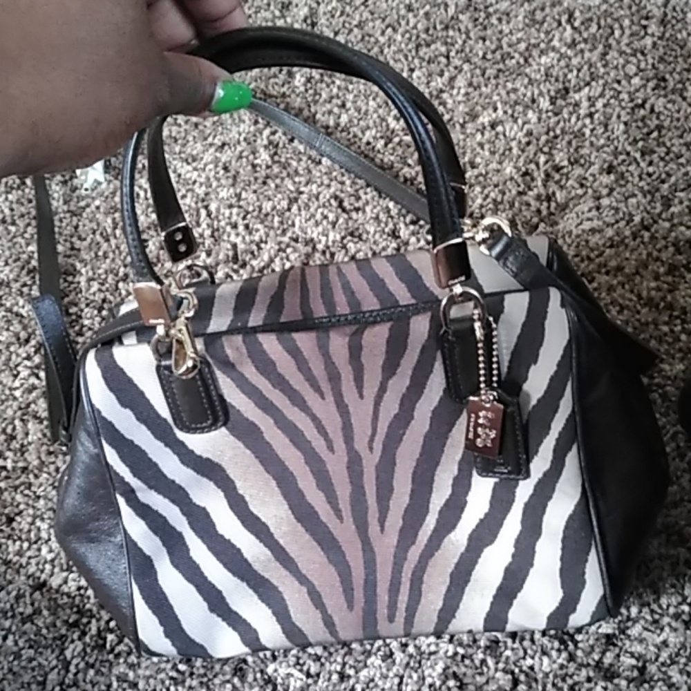 Hand held and strap